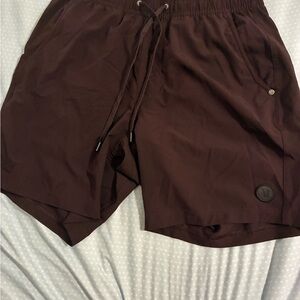 Vuori Men's Athletic Shorts in Dark Brown